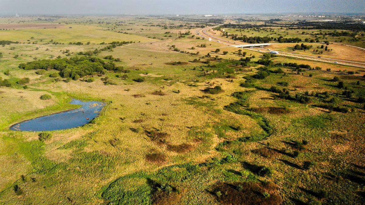 A Rivian automotive plant is proposed to be built on 2,000 acres of undeveloped land south of Interstate 20, just east of the Interstate 20/I-30 split near Aledo. It would be part of the master-planned Walsh community.