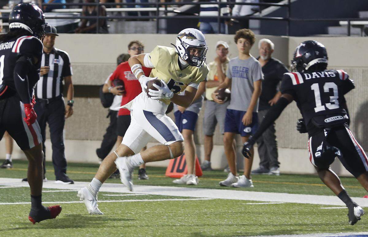 Keller’s Bodie Davis catches a pass near the goal line against Euless Trinity during their game on Friday, October 17, 2025 at Pennington Field in Bedford, Texas.