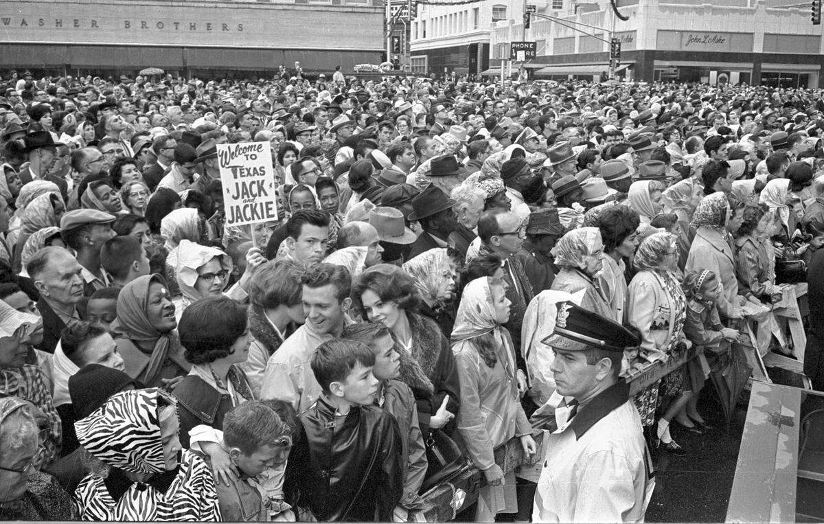 Crowds outside Hotel Texas in downtown Fort Worth, waiting to greet President John F. Kennedy, 11/22/1963