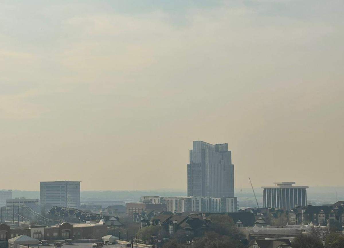 Smoke from a wildfire burning on Sunday in Coryell County, about 130 miles south of Fort Worth, tinged brown skies in the metropolitan area, according to the National Weather Service.