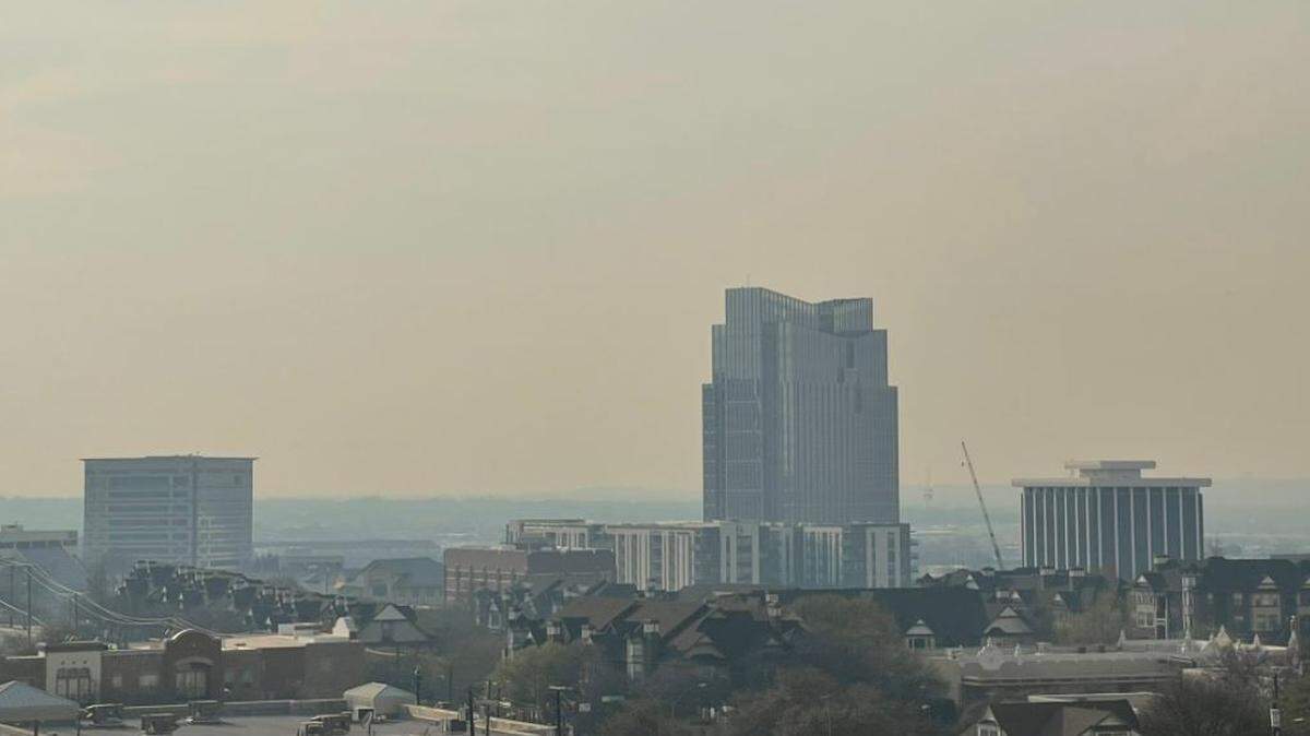 Smoke from a wildfire burning on Sunday in Coryell County, about 130 miles south of Fort Worth, tinged brown skies in the metropolitan area, according to the National Weather Service.