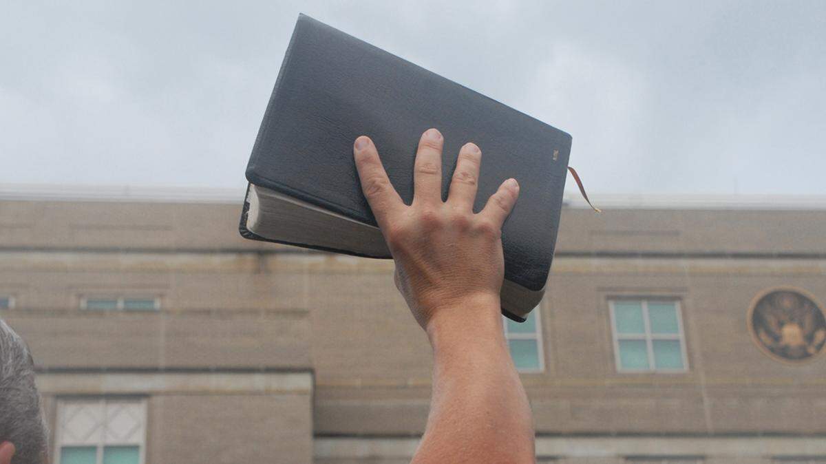 PENSACOLA, FL - SEPTEMBER 17: Protesters in Pensacola support highschool educators on September 17, 2009. The educators are on federal trial following the ACLU charge that they prayed in school. separation of church and state school education bible