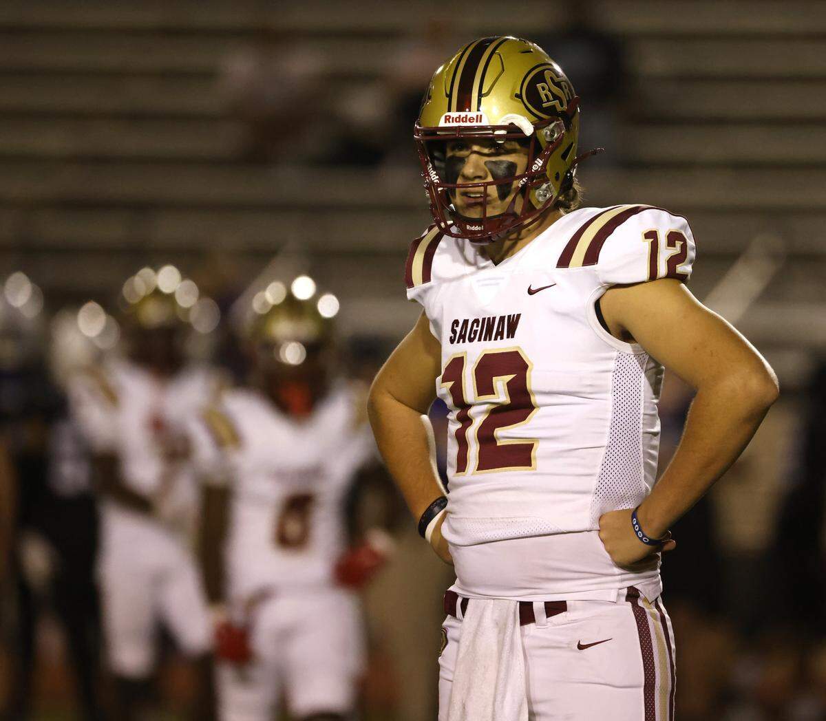 Saginaw quarterback Joshua Greek (12) looks disgustedly to the sidelines after his receiver dropped a pass in the backfield during the first half of a UIL football game between Saginaw and Paschal at Farrington Field in Fort Worth, Texas, Thursday, October, 16, 2025.