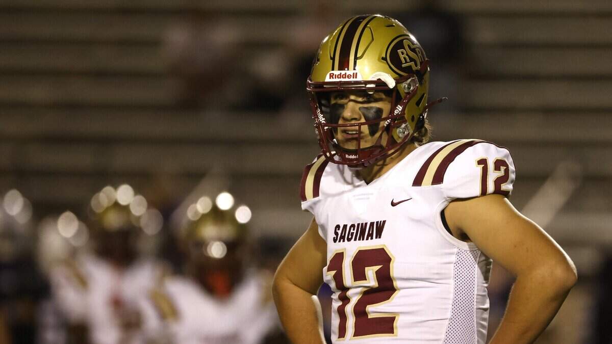 Saginaw quarterback Joshua Greek (12) looks disgustedly to the sidelines after his receiver dropped a pass in the backfield during the first half of a UIL football game between Saginaw and Paschal at Farrington Field in Fort Worth, Texas, Thursday, October, 16, 2025.