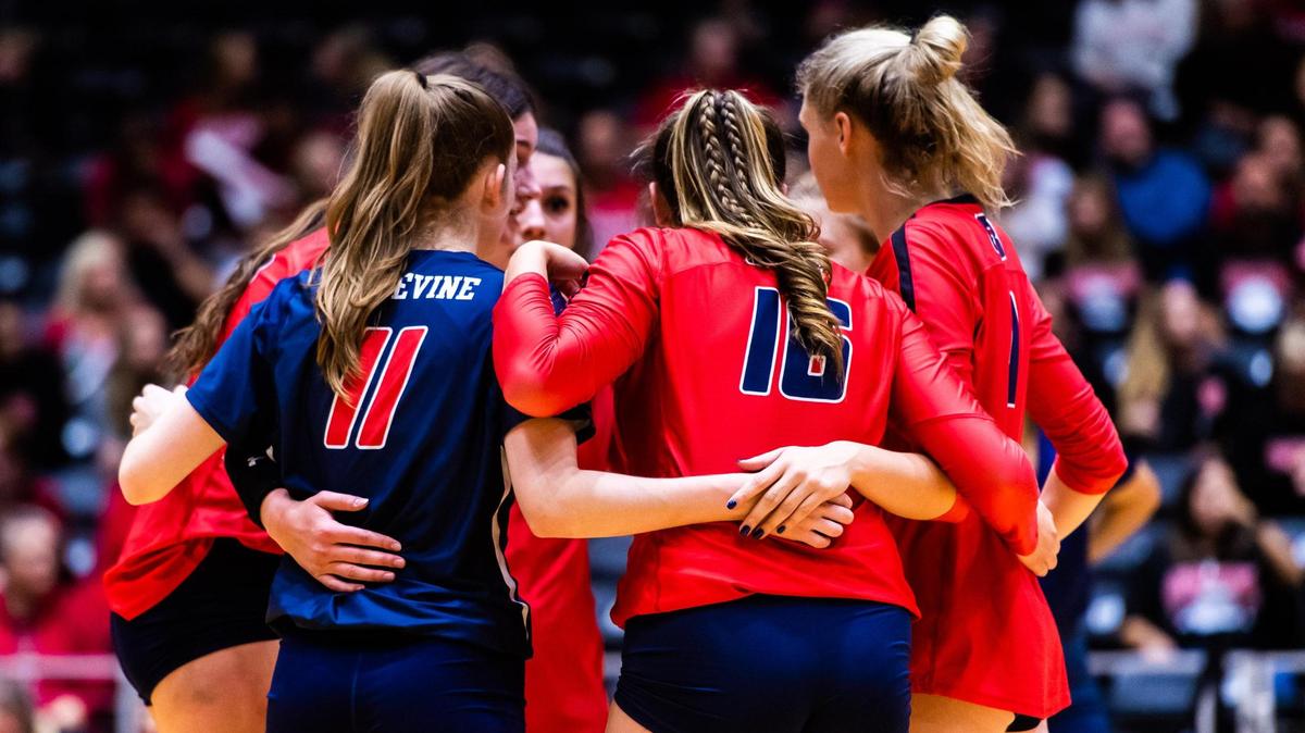 The Mustangs huddle up on the court after a timeout while behind in set 2 during the 5A state semifinal game between Grapevine and Comal Canyon at the Curtis Culwell Center in Garland on November 19, 2021. Photo by Matt Smith. Special to the Star-Telegram.