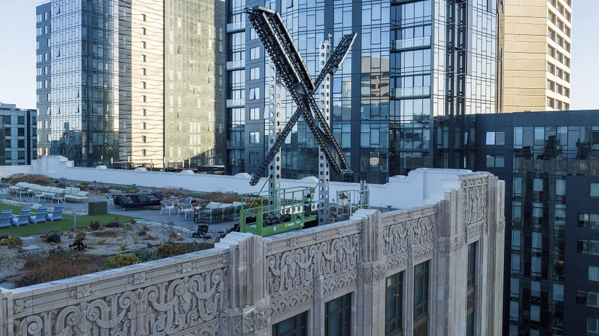 An “X” sign rests atop the company headquarters in downtown San Francisco, on July 28, 2023. Elon Musk’s social media company, formerly known as Twitter, has filed a lawsuit against liberal advocacy group Media Matters for America. X says Media Matters manufactured a report to show advertisers’ posts alongside neo-Nazi and white nationalist posts in order to “drive advertisers from the platform and destroy X Corp.”