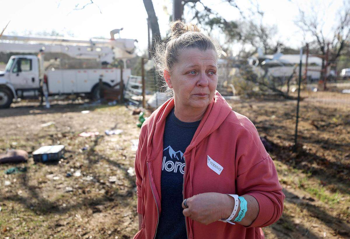 Amber Zeleny worries about her husband, Shawn, who was injured when a tornado ripped through their property in Johnson County on Monday evening, April 4, 2022. Shawn was injured when a travel trailer flipped on top of him while he was helping his daughter get out.