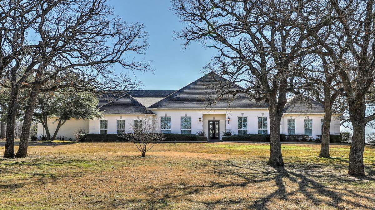 The luxury estate at 524 Edgewood Lane is located on 80 rolling acres.