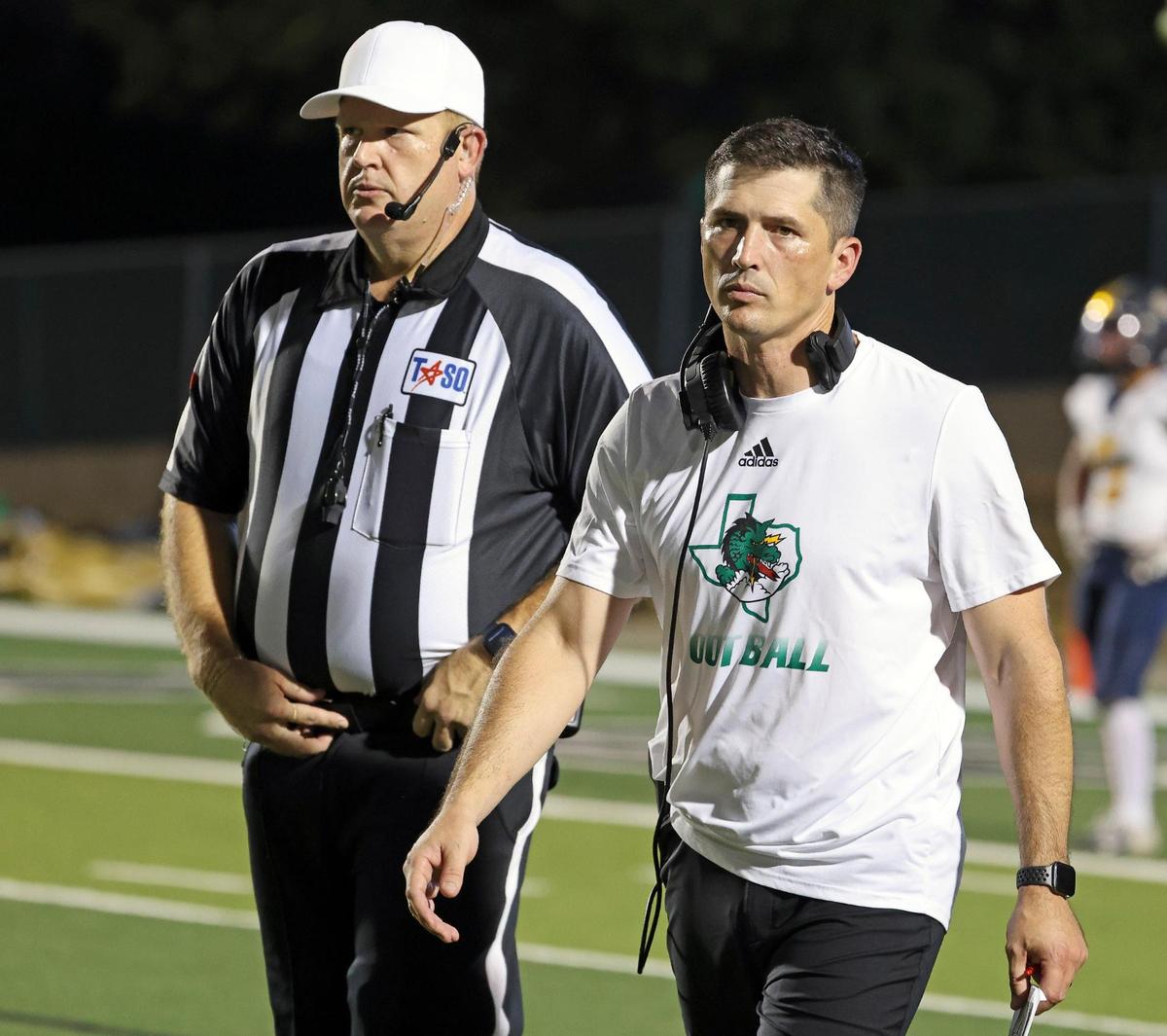 Carroll head coach Riley Dodge returns to the sidelines after arguing a no call with officials in the first half of an UIL football game at Dragon Stadium in Southlake, Texas, Friday Aug. 25, 2023.