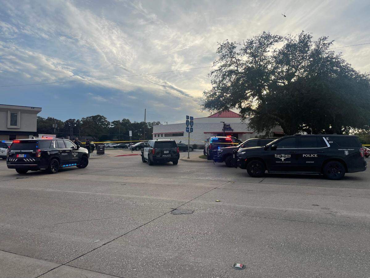 Fort Worth police respond to a 911 call reporting that an officer was shot Monday afternoon, Nov. 27, 2023 at the Fort Worth Community Credit Union on Brentwood Stair Road.