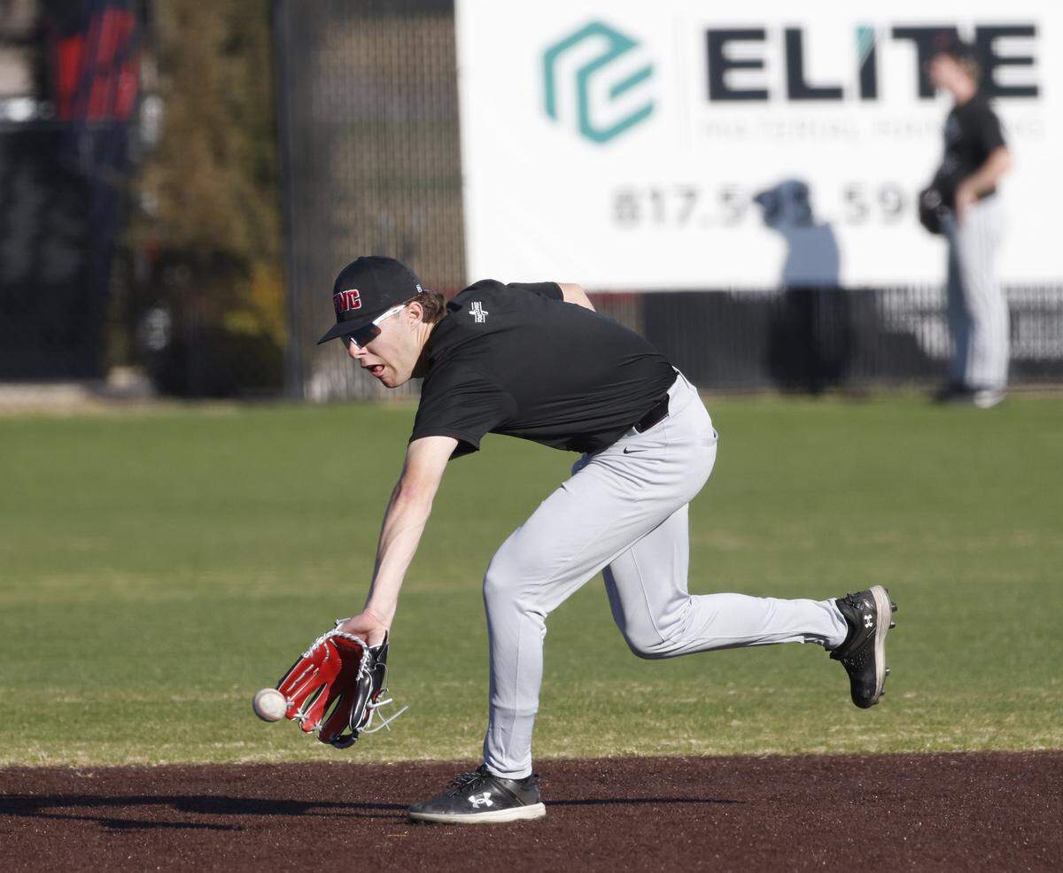 Fort Worth Christian short stop Grady Emerson backhands a ground ball during baseball practice at Fort Worth Christian School in North Richland Hills, Texas, Monday Feb. 23, 2026.