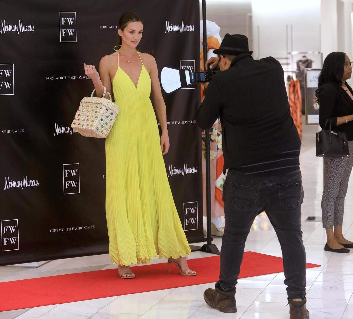 Dallas model Mollie O’Neal wears a dress by Alice + Olivia while showcasing Neiman Marcus’ spring looks during Fort Worth’s inaugural fashion week on Tuesday, February 22, 2022.