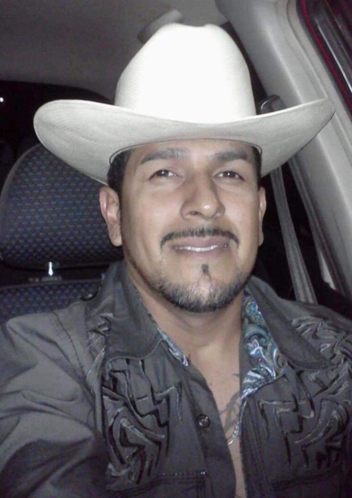 Arnulfo Omar Martinez smiles for a photo in a cowboy hat. Martinez, who was killed in a shooting at horse stables in Fort Worth on Aug. 6, always loved horses and bought his first one three years ago, according to family.