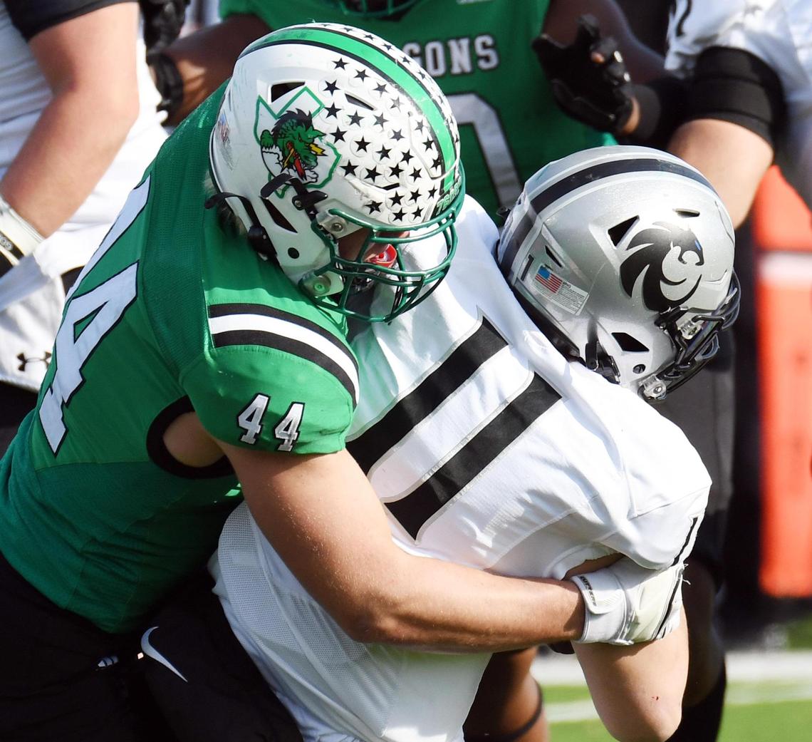 Southlake Carroll’s Dustan Mark, left sacks Denton Guyer quarterback Jackson Arnold in the first quarter of Saturday’s December 3, 2022 6A Division 2 Region 1 Finals playoff football game at the Northwest ISD Stadium in Justin, Texas. Special/Bob Haynes