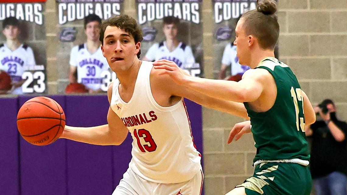 Fort Worth Christian guard Alex Bossinakis (13) tries to get around The Woodlands Christian Academy guard Austin Benigni (R) during the first half of the 5A TAPPS Boys Basketball State Championship game played on March 12, 2021 at College Station High School in College Station, TX. (Steve Nurenberg Special to the Star-Telegram)