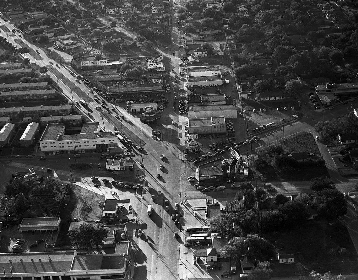 This 1950 aerial, taken by Star-Telegram photographer Herbert Key, gives a good overview of the intersection. Post-war traffic was steady. Only two of the commercial buildings in the photo are still standing – Dow Art Galleries on Camp Bowie at the far upper left and the 1928 structure in back of the Humble gas station (between West Seventh and Camp Bowie) that now houses the Great Outdoors sub shop and other businesses.