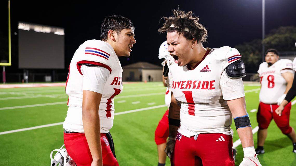 Carter-Riverside quarterback Jacob Galindo and running back Deandre Fields celebrate with each other after clinching a playoff berth during a district game at Scarborough-Handley Field in Fort Worth, Texas on November 7, 2025. Carter-Riverside quarterback Jacob Galindo and running back Deandre Fields celebrate with each other after clinching a playoff berth during a district game at Scarborough-Handley Field in Fort Worth, Texas on November 7, 2025.