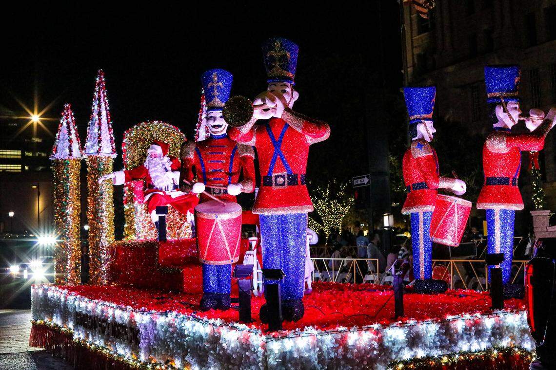 Santa waves to GM Financial Parade of Lights attendees in downtown Fort Worth.
