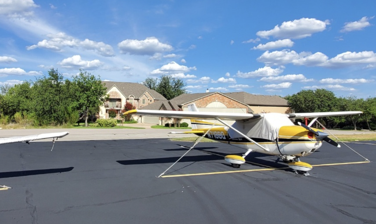 A $2.185 million Lakeway, Texas home comes with an airplane hangar, golf course views and luxury finishes.