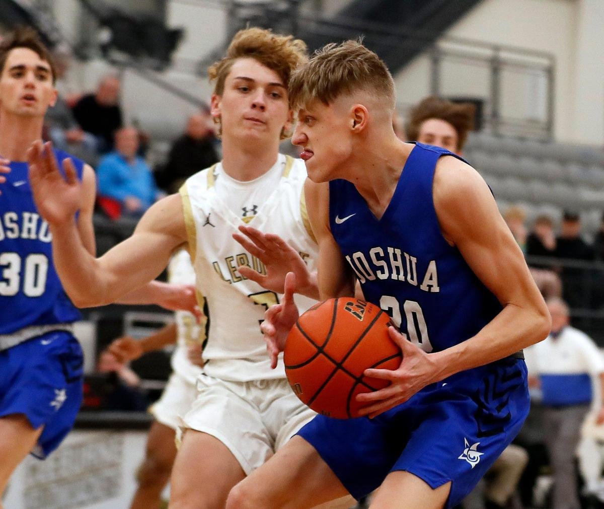 Joshua guard Brandon Ayars (20) pulls up to shoot in front of Cleburne’s Landry Shields (3) during the first half of a 14-5A high school basketball game at Cleburne High School in Cleburne, Texas, Tuesday, Feb. 09, 2021. Joshua led 43-28 at the half. (Special to the Star-Telegram Bob Booth)