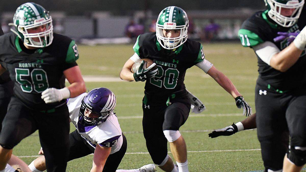 Azle’s Billy Heath, center takes the ball up the middle for a touchdown and a 13-7 lead over Crowley during the first quarter of Friday’s October 4, 2019 football game at Hornet Stadium in Azle, Texas. Special/Bob Haynes