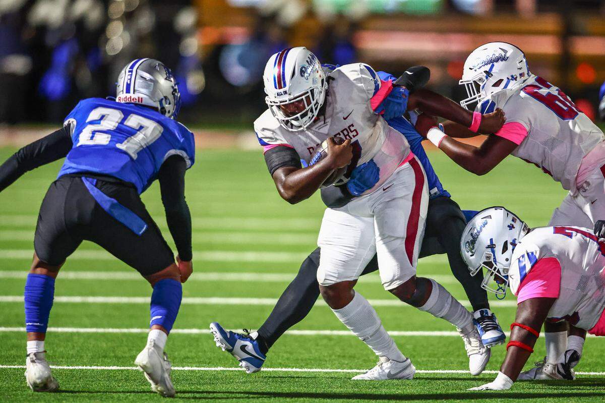Fort Worth Southwest running back Raylon Carter runs toward Eastern Hills linebacker Zach Bartley-Fox on Thursday, Oct. 17, 2024 at Scarborough-Handley Field in Fort Worth, Texas.