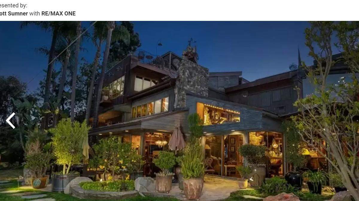 The house sits on the 10th hole of a private golf course