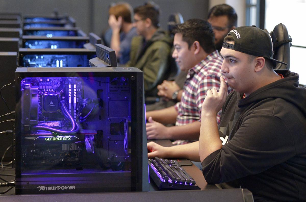 Gamers get a chance to play with gaming computers at the new Esports Stadium Arlington in Arlington, TX, Monday, Nov. 19, 2018.