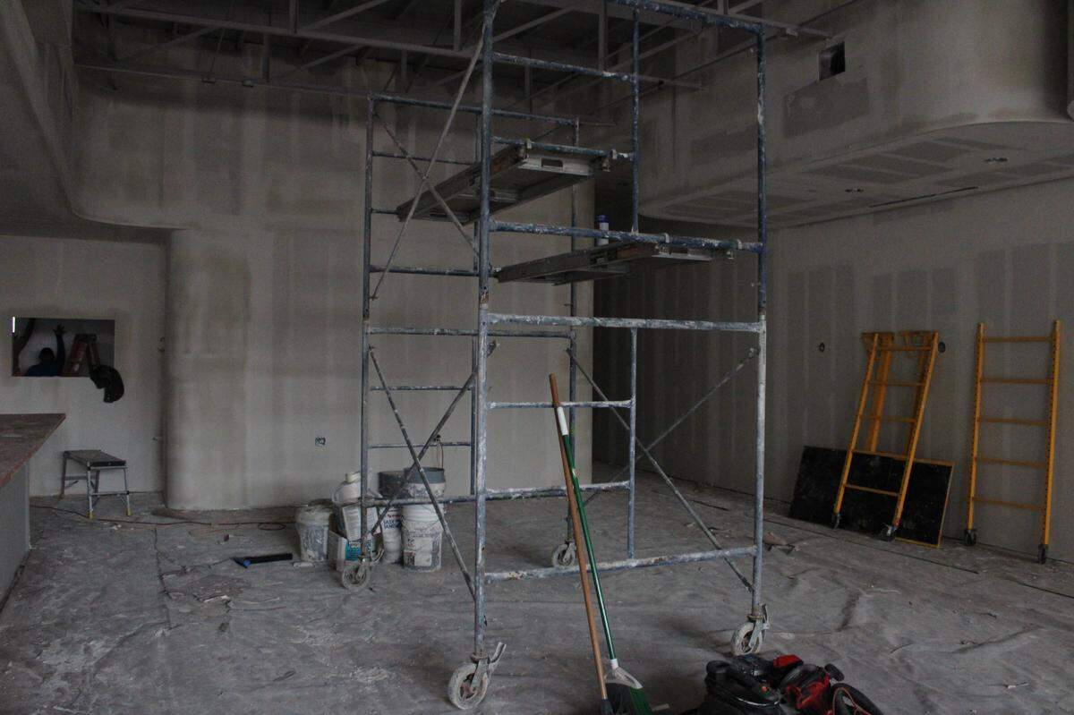 Construction continues inside the Ampersand University Drive location. When the store next door closed last year, it gave Toan Luong and his partners the chance to tear down walls and expand.