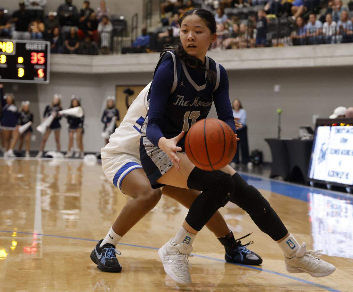 Flower Mound guard Emily Tran (12) makes a cutback against North Crowley during the second half of a UIL Class 6A Division I girls regional final basketball playoff game at Arlington ISD Athletics Center in Arlington, Texas, Friday Feb. 27, 2026.