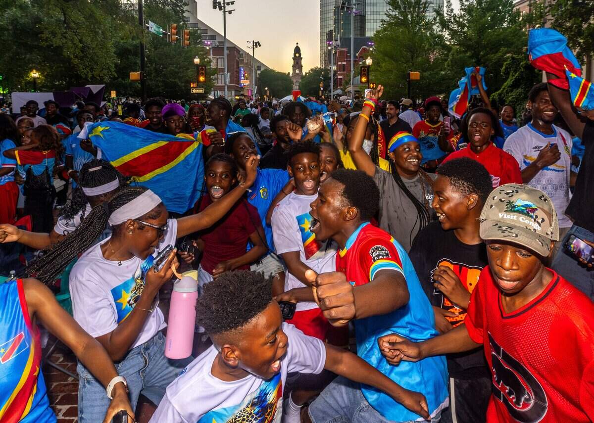 Democratic Republic of Congo fans celebrate a win against Uzbekistan during a FIFA Summer of Soccer event at Sundance Square in Fort Worth on June 27, 2026.