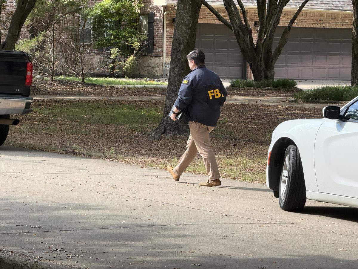 FBI agents were seen outside the home of Dallas ICE shooting suspect Joshua Jahn’s parents in Fairview, Texas, on Wednesday afternoon, and police were blocking the street.