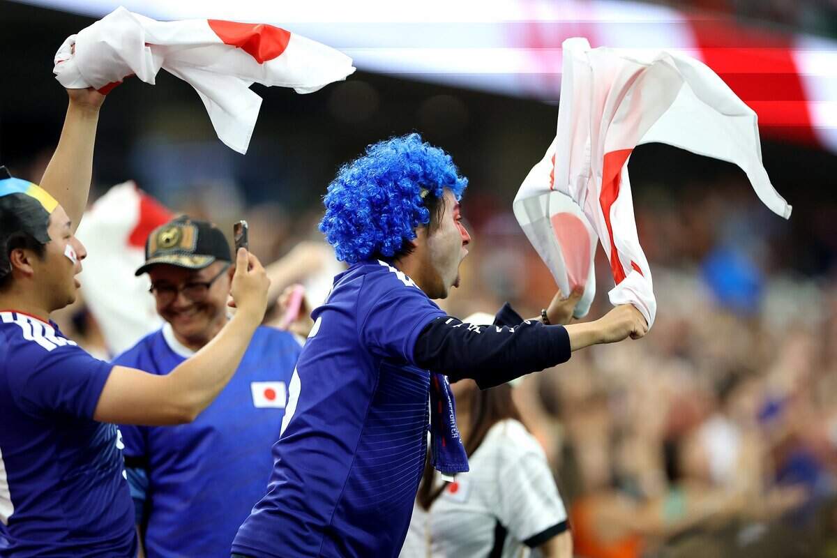 Japan fans celebrate a goal by their team against Netherlands during a World Cup matchup on Sunday, June 14, 2026, at Dallas Stadium in Arlington.