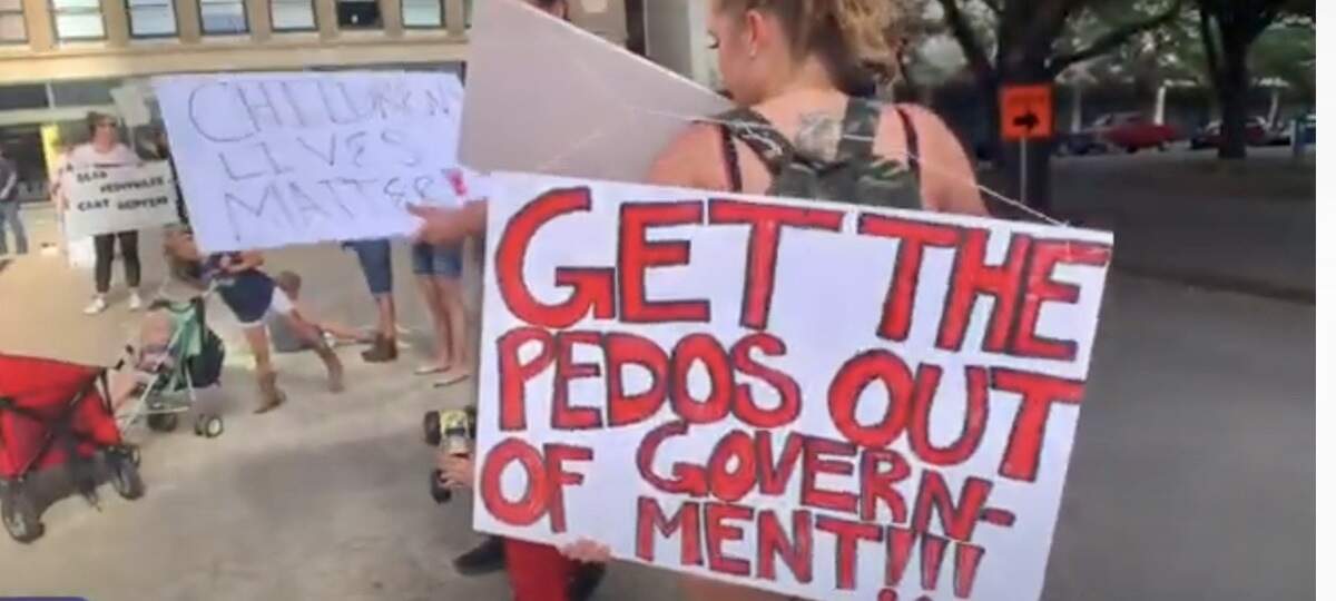 From YouTube videos, a QAnon rally in Burnett Park and at the Tarrant County courthouse featured signs such as this and “Pizzagate is real.”