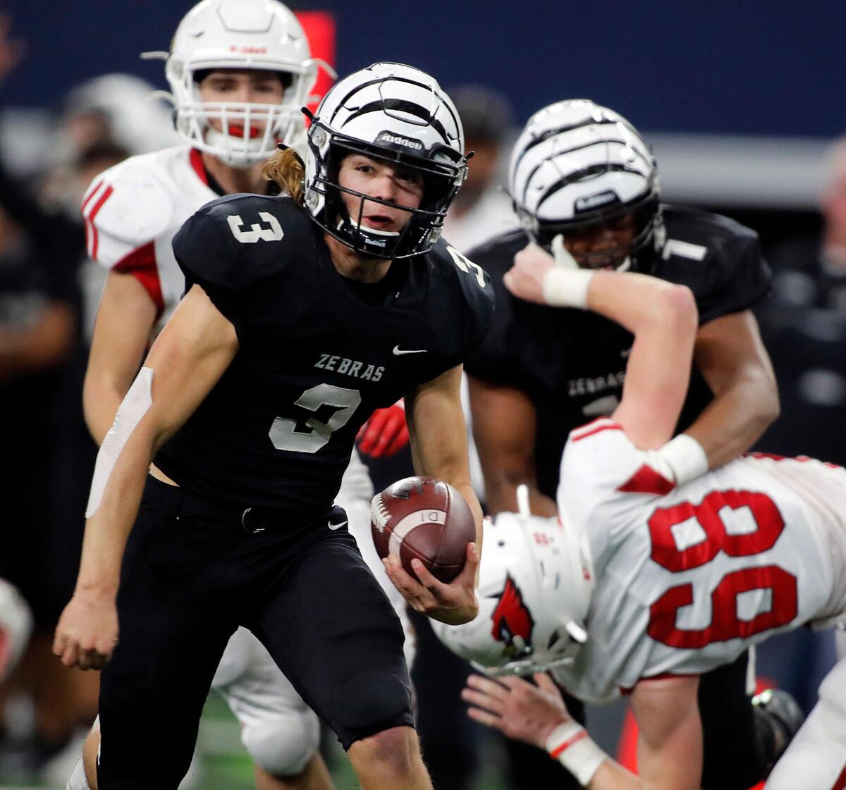 Offensive and defensive MVP of the game Grandview quarterback/free safety Dane Jentsch (3) gains yardage up the middle during the second quarter of a conference 3A division I State Championship football game at AT&T in Arlington, Texas, Thursday, Dec. 19, 2019. Grandview led 28-21 at the intermission. (Special to the Star-Telegram Bob Booth)