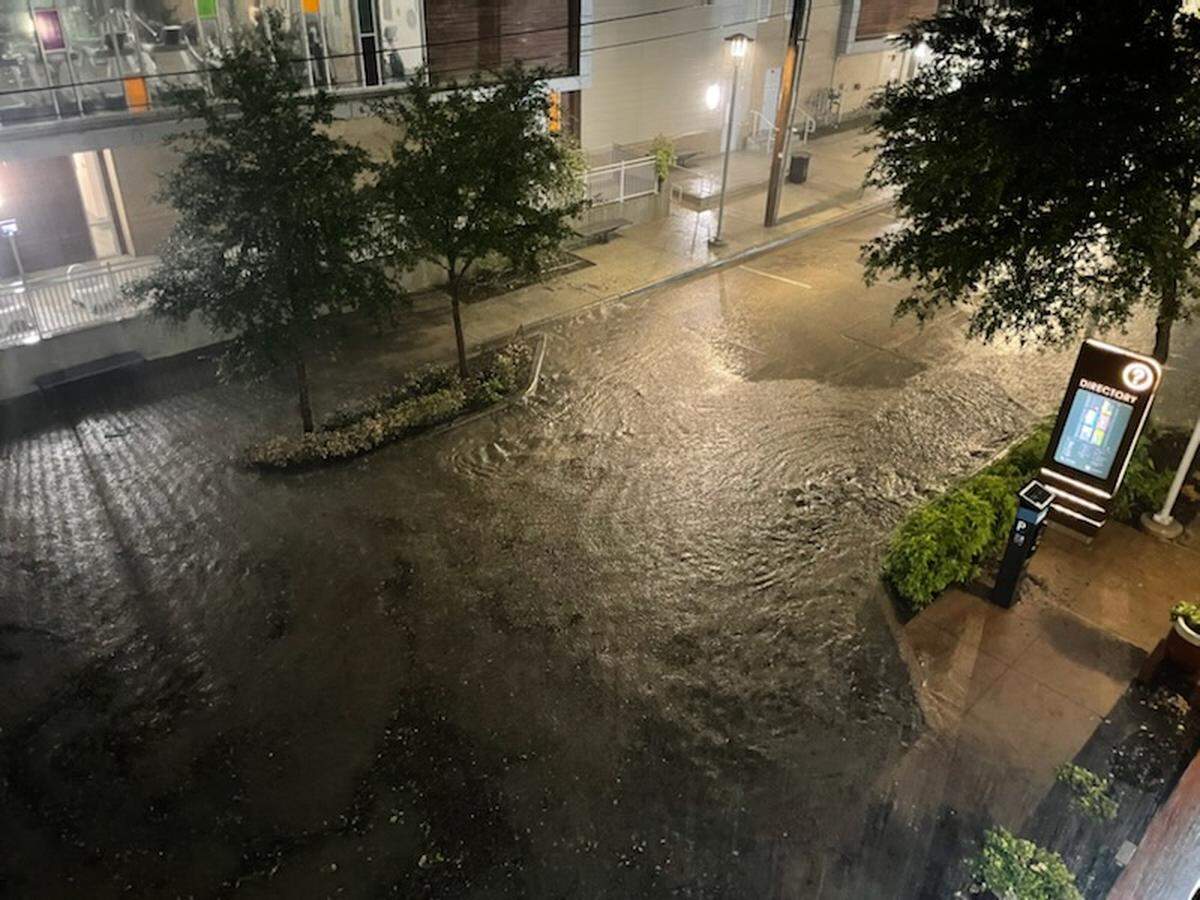Severe storms flooded parts of Fort Worth late Wednesday, including Crockett Street in the West 7th entertainment district.