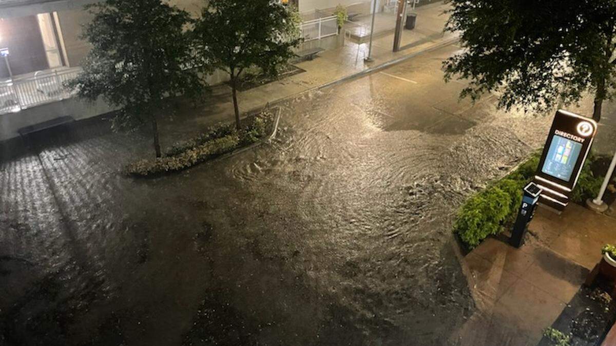 Severe storms flooded parts of Fort Worth late Wednesday, including Crockett Street in the West 7th entertainment district.
