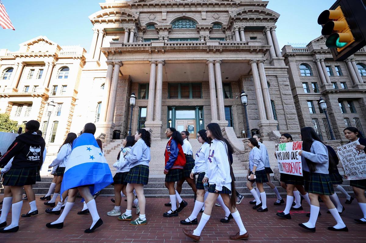 Students at Young Women’s Leadership Academy in downtown Fort Worth walk out of school on Monday, Feb. 3, to protest federal immigration policies they say are harming their families.