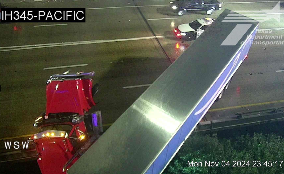 Parts of Interstate 345 near Dallas were closed for several hours early Tuesday due to an 18-wheeler hanging off the overpass. No injuries were reported in the crash, officials say.
