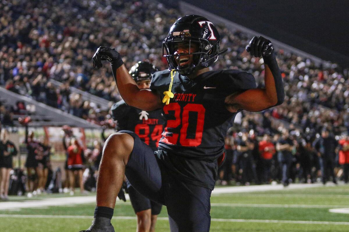 Trinity’s Josh Bell celebrates a touchdown during a UIL football game at Pennington Field on Friday November 7, 2024.