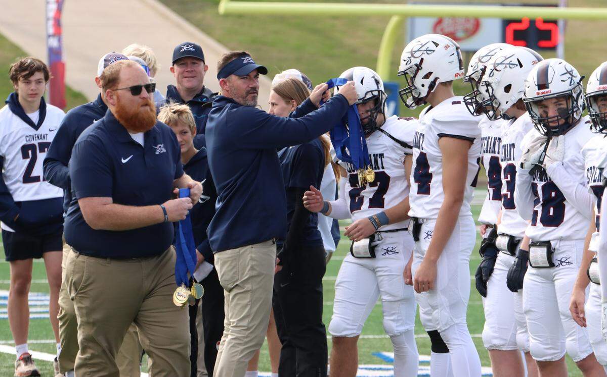 The Fort Worth Covenant Classical football team receives their gold medals after defeating Huntsville Alpha Omega in the TAPPS Six-Man Division II Championship game on Thursday, Dec. 5, 2024 at Waco ISD Stadium in Waco, Texas.