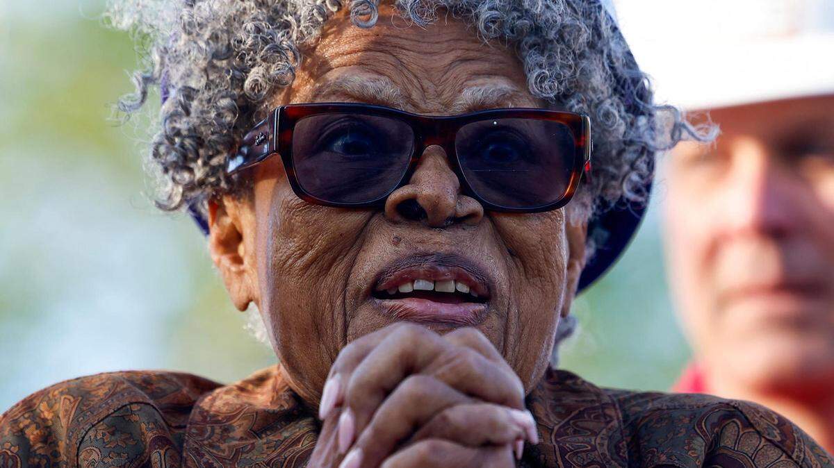 Opal Lee reacts as dignitaries speak prior to raising the first wall on her new home on Thursday, March 21, 2024, in Fort Worth. She received an honorary doctorate degree from Southern Methodist University at a ceremony Saturday.