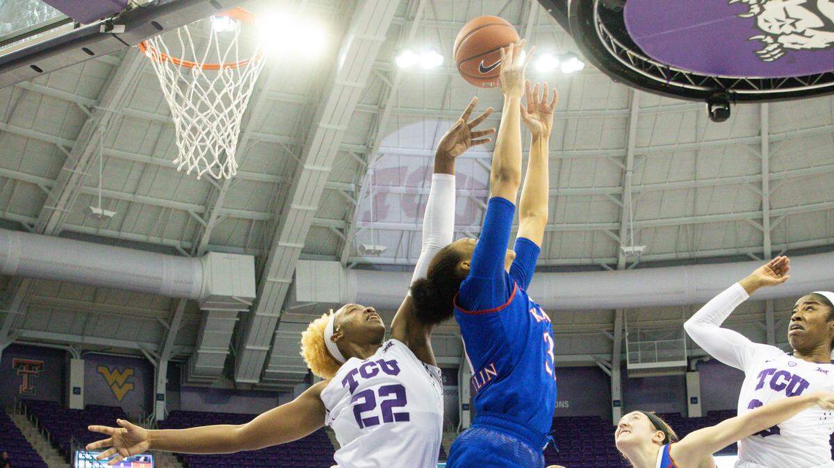 TCU’s Jordan Moore goes for a rebound against Kansas on Jan. 27, 2019.