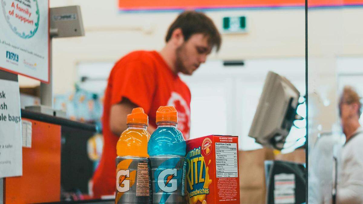 Is it up to grocery stores and businesses to decide if they enforce an all-group ID check or just a check for the person buying alcohol.