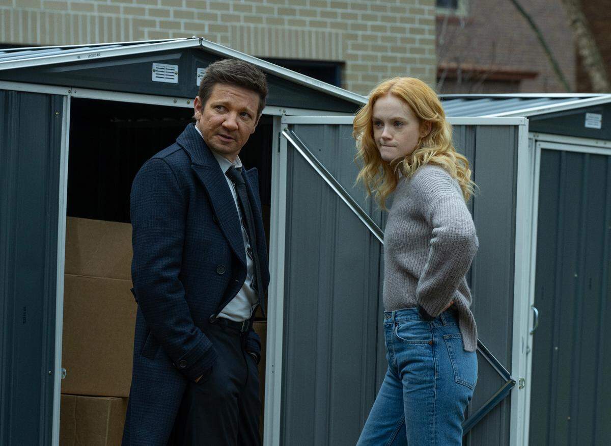L-R: Jeremy Renner as Mike McLusky and Emma Laird as Iris in episode 1, season 3 of Mayor of Kingstown streaming on Paramount+, 2024.