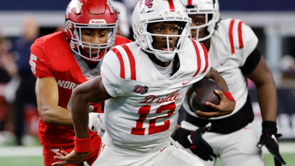 Duncanville quarterback Keelon Russell (12) takes off on a long carry during the second half of the UIL Conference 6A Division 1 state championship football game at AT&T Stadium in Arlington, Texas, Saturday, Dec. 16, 2023.