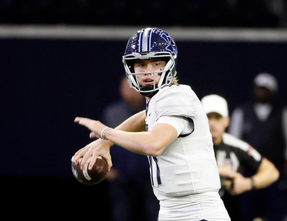 Liberty Christian quarterback Cole Welliver (11) passes to the flat in the first half of a TAPPS Region 2 semi-final football playoff game at The Ford Center in Frisco, Texas, Saturday, Oct. 25, 2023.