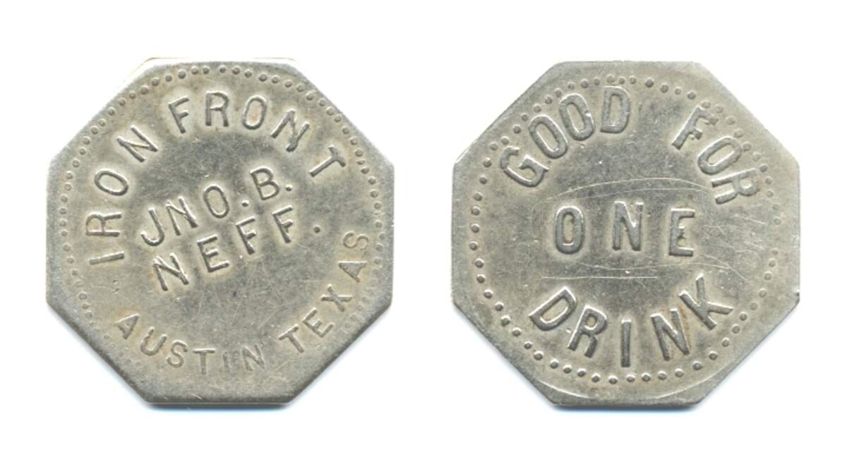 Some early saloons circulated tokens for free drinks to promote business, like this token from an Austin saloon.