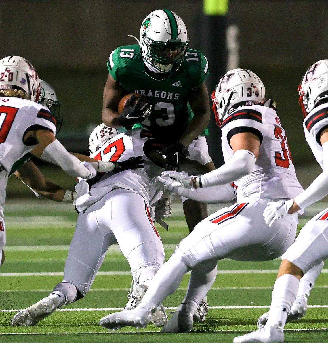 Southlake Carroll tight end RJ Maryland (13) tries to find a hole to run against Rockwall Heath during the first half of a High School Football game, Friday night, October 2, 2020 played at Dragon Stadium in Southlake, TX. (Steve Nurenberg Special to the Star-Telgram)