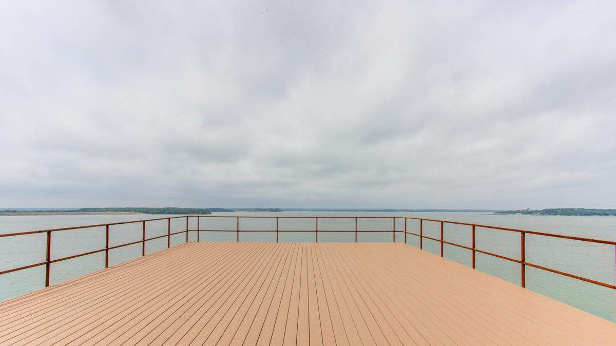 Sitting on the highest point on Eagle Mountain Lake, 9007 Dickson Rd. has a rooftop deck that has commanding views of the surrounding scenery.
